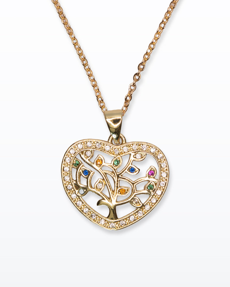Radici Preziose – Collana oro con cuore e albero vita