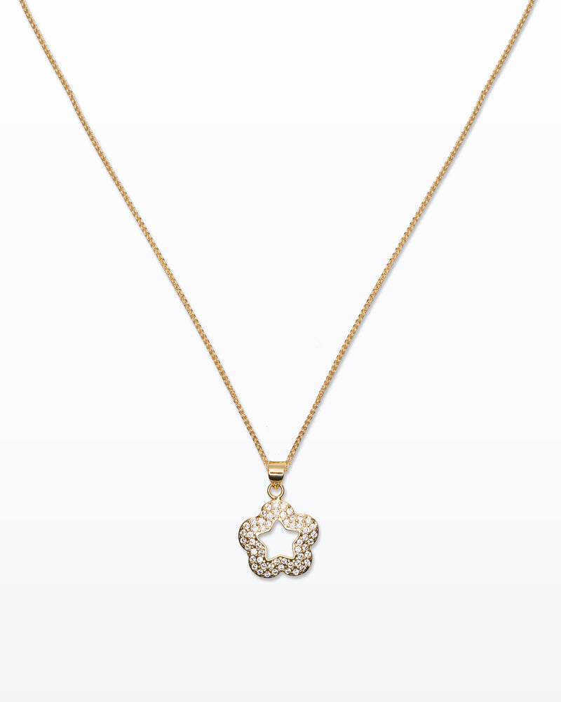Star Bloom – Collana dorata con fiore e stella centrale